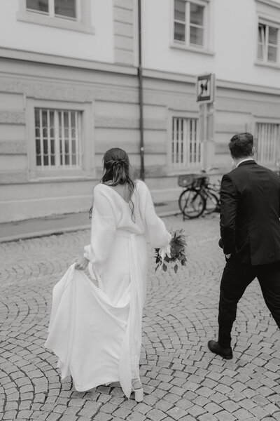 Couple walking at their luxury wedding in Austria