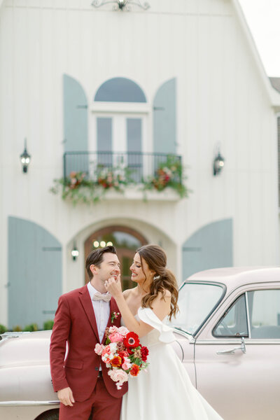 timeless wedding couple smiling at each other
