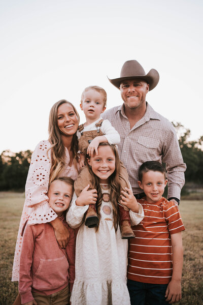 family of four, joyful smiles