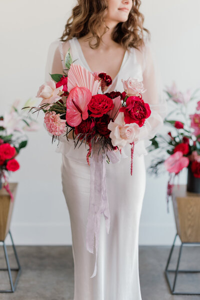 Delicious pink and berry hues in this fresh microwedding with florals by Hen & Chicks, classic Calgary, Alberta wedding florist, featured on the Brontë Bride Blog.