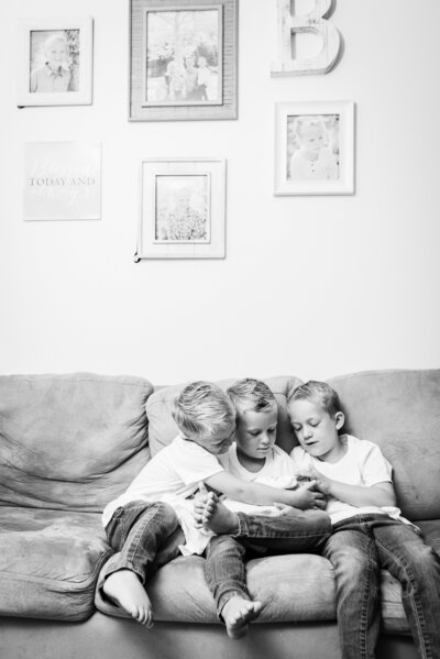 In-home lifestyle Newborn Photo session, sibling love, taken in Coto De Caza, California