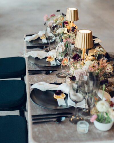 Reception table at wedding by  film wedding photographers Nicole Simensky