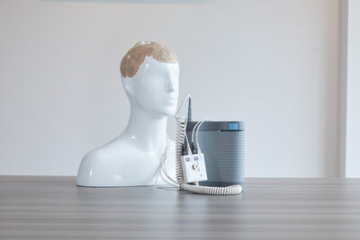 Image of the Optune device