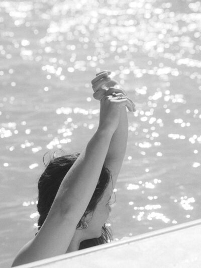 Relaxed moment in pool, luxury content creation for wellness and lifestyle brands