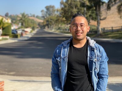 Three16 Photography videographer Angel stops to give a big smile