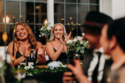 bridesmaid laughing during speech