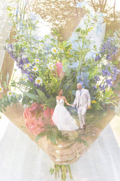 Double exposure of bride's hands holding bouquet with couple walking.