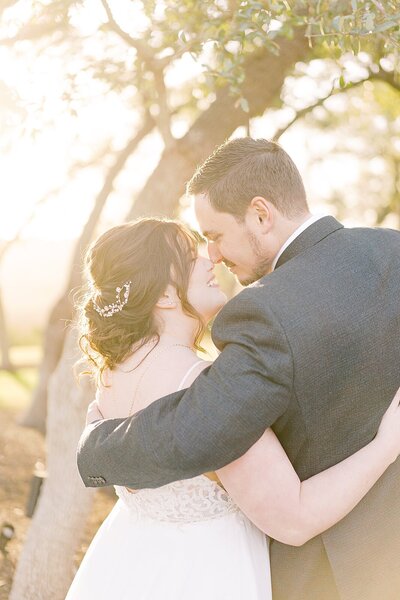 Golden hour wedding portraits on the ridge at Canyonwood Ridge