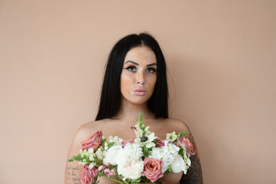 boudoir headshot with flowers at Louisville studio 