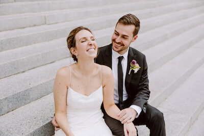 happy candid couple walking together at february nashville wedding at richland country club