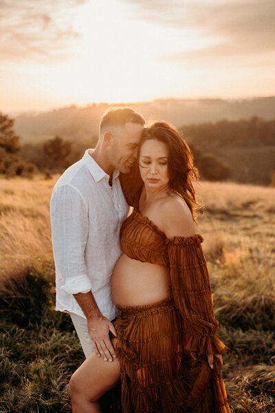 maternity session, mom and dad with boho backdrop in allentown PA
