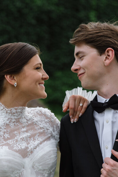 Bride and groom look at each other lovingly