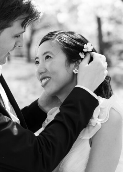 romantic garden engagement session during cherry blossom season in Washington, D.C.