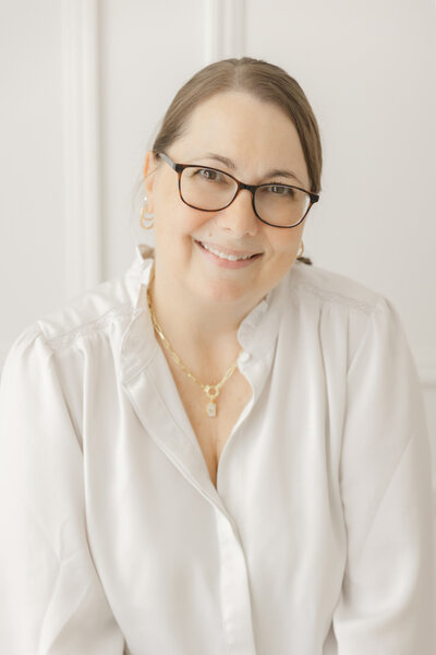 Newborn and maternity photographer Christy Johnson in her Wake Forest NC studio