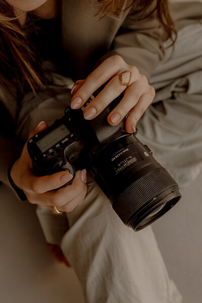 Photographer holding a camera