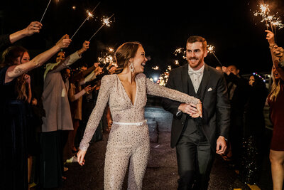 Wedding couple grand exit with sparklers
