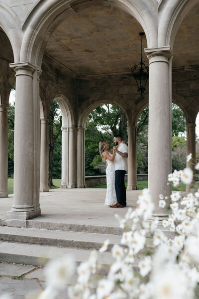 Couple dancing outdoors during their engagement shoot before their wedding | Emma LeeAnn Photography