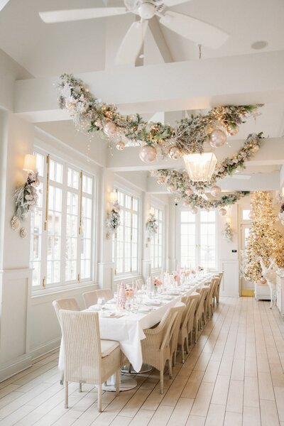a long dining table decorated for a party