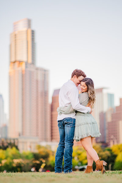 Couple enjoy an evening together in Butler Park in Austin, Texas. Photograph taken by Austin Wedding Photographers, Joanna and Brett
