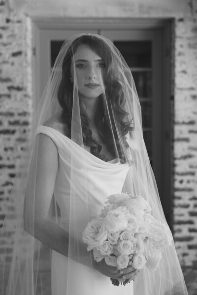 Hair and Makeup Orlando Florida | Luxury Bridal Hair and Makeup Services in Central Florida Beauty Brigade | Bride wearing a beautifully styled updo with her bridesmaids