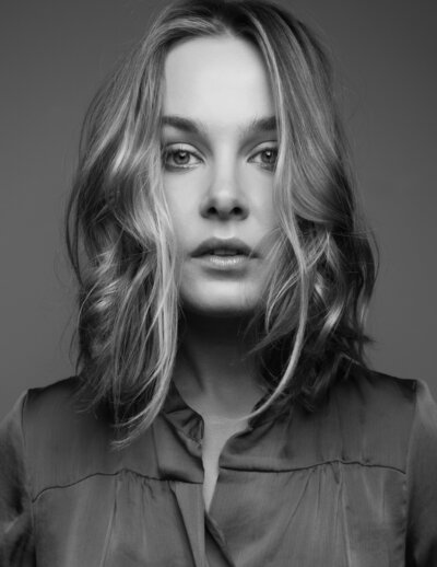 Stunning black and white portrait by Daisy Rey in Jersey City photography studio.