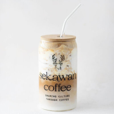 Iced coffee cup with coffee company branding on it