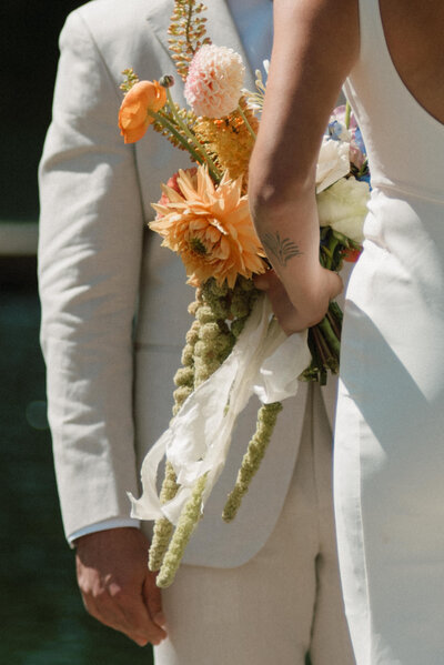 detail photo of bridal bouquet captured during their fernie wedding