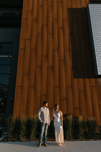 couple standing on a rock  taken by fargo wedding photographer kiella lawrence