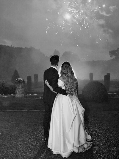 married couple looking at the wedding fireworks at de vere tortworth 