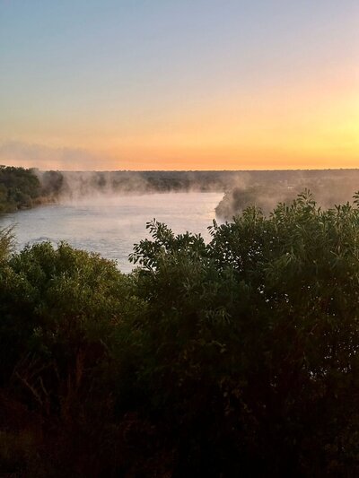 mist covering the okavango river in the mornings