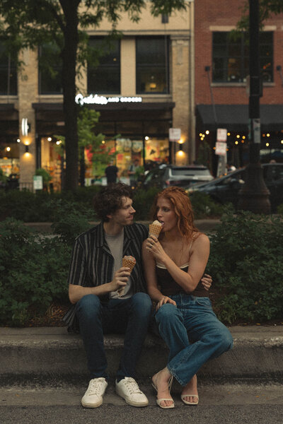 Fun and candid moment captured inside a vintage photo booth, highlighting the playful and spontaneous side of love and relationships