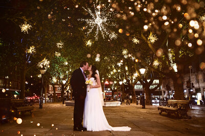 And and Derek wedding photo in front of fireworks