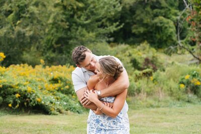 Couple getting engagement photos in Boston