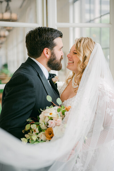 Wedding Couple smiling at St. Anthony Hotel in San Antonio