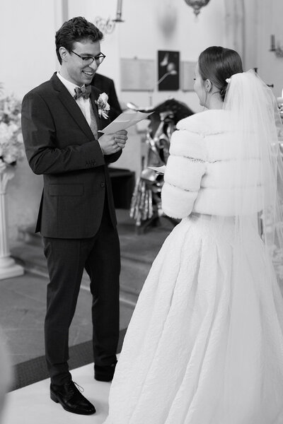 Luxury wedding in Europe – sophisticated bride in a modern wedding gown and groom in a timeless suit.