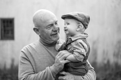 Grandfather holding his grandson during a heartfelt family session in Pennsylvania