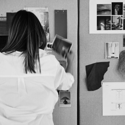 Vier Design Co Founder putting together a vision board