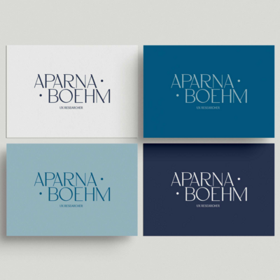 Four business cards laid out together for Aparna Boehm