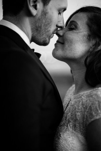 bride and groom posing for photo