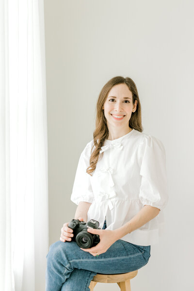 Headshot of Sabrina Reagan Austin  newborn photographer.