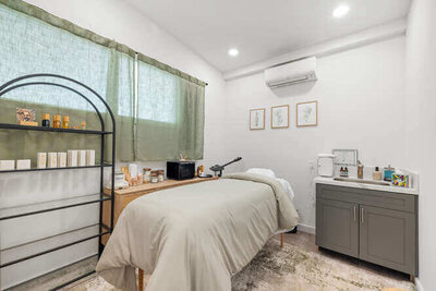 Massage and bodywork therapy room with relaxing décor
