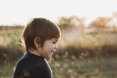 Summer portrait with a boy during golden hour light in Corpus Christi, Texas.