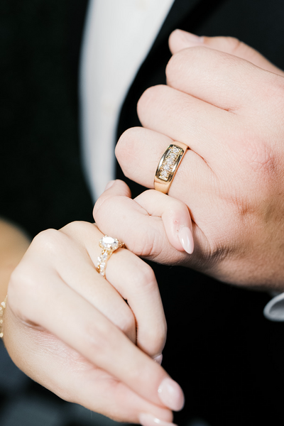 Pinky promise between hands of groom and bride | Megan Smith Photography