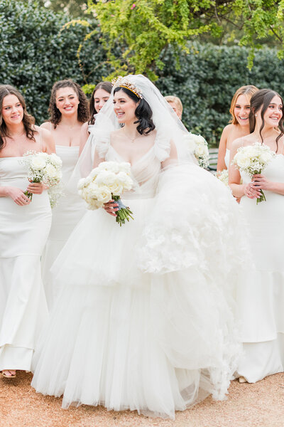 Bride-with-her-bridesmaids-dressed-in-white