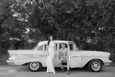 Black and white blurry photo of a pair of white heels