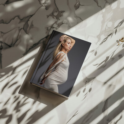 Folio album of 5x7 pictures in a black keepsake box from a Greensburg photography studio.