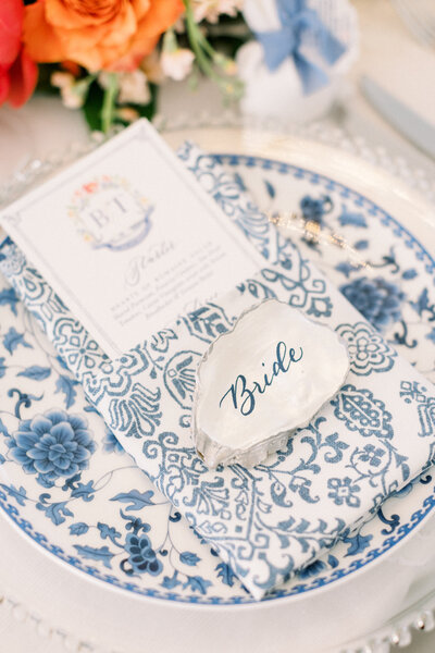 Oyster shell place card with navy blue calligraphy for wedding at Belle Mer in Newport, Rhode Island