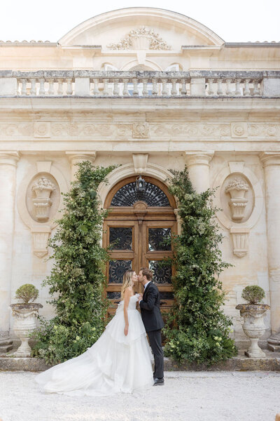 Bride and groom walk up memorial steps at their DC wedding