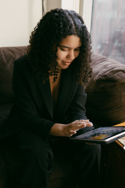 Catryce Looking and Scrolling on Tablet