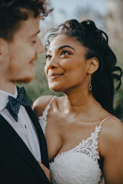 bride gazing at her new husband with love